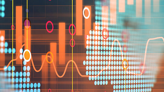 A graphic of bar and line graphs overlaid on a world map.